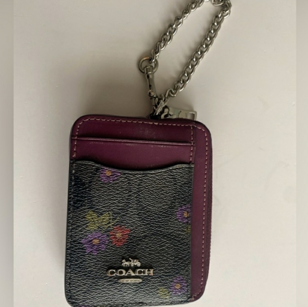 Coach wristlet mini wallet with silver chain. Purple with floral print